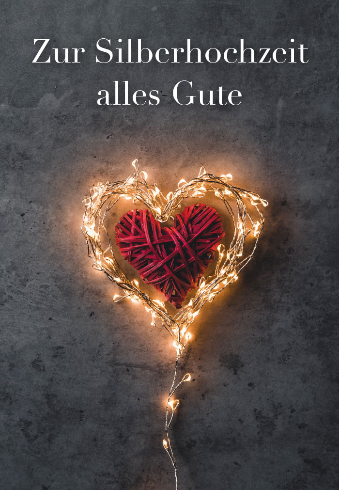 Silberhochzeit - rotes Herz umgebend von Licht Silberhochzeit - rotes Herz umgebend von Licht