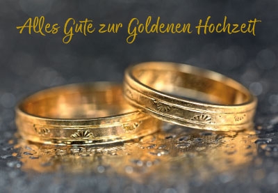 Goldhochzeit - zwei goldene, feuchte Ringe